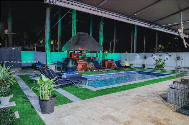 view of pool with a gazebo, a playground, and a patio