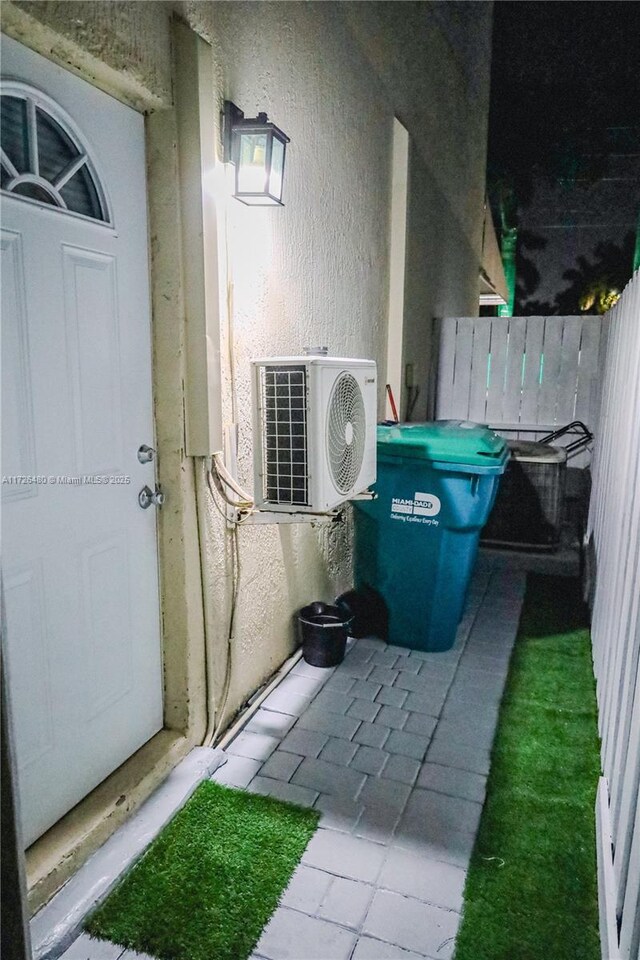 exterior space with ac unit