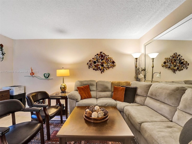 living room with a textured ceiling