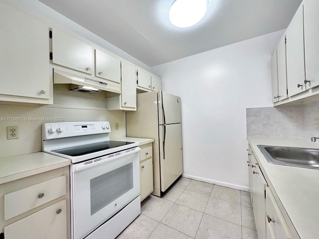 kitchen featuring sink, white appliances, white cabinetry, and light tile patterned flooring