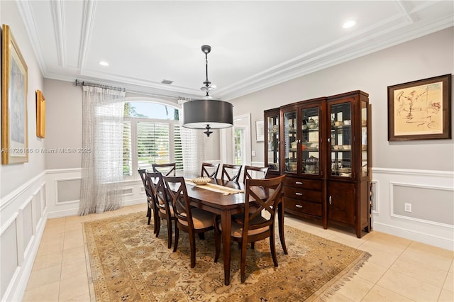 tiled dining room with ornamental molding