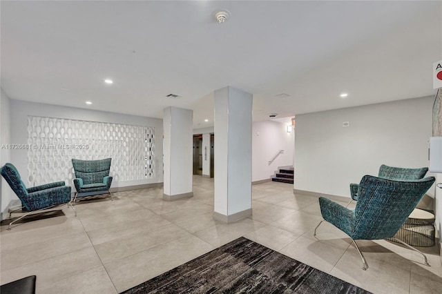 sitting room with light tile patterned floors