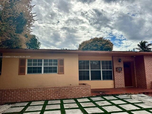 view of front facade with a patio