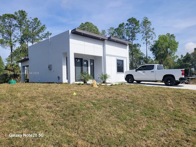 view of property exterior featuring a yard