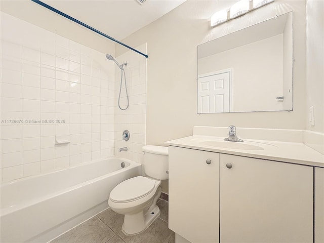 full bathroom with toilet, tiled shower / bath combo, tile patterned floors, and vanity