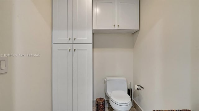 bathroom featuring toilet