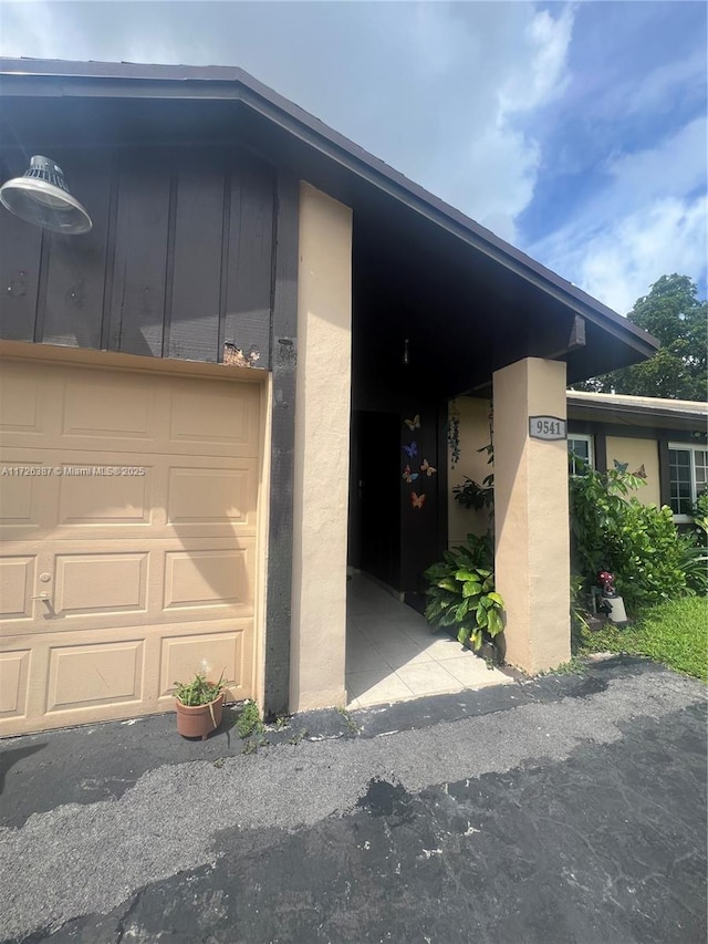 exterior space featuring a garage