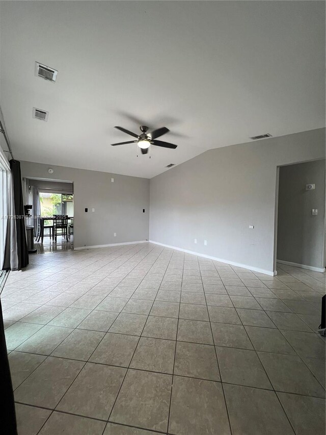 9541 W Daffodil Ln Unit 0, Miramar, FL 33025 - tiled empty room featuring a ceiling fan and baseboards