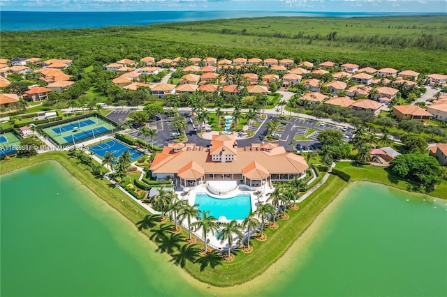 bird's eye view featuring a residential view and a water view