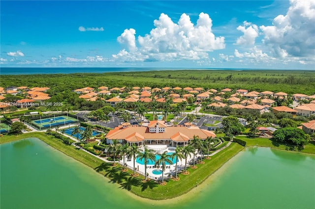 aerial view with a residential view and a water view