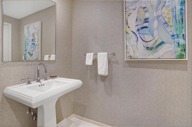 bathroom featuring tile patterned flooring and sink