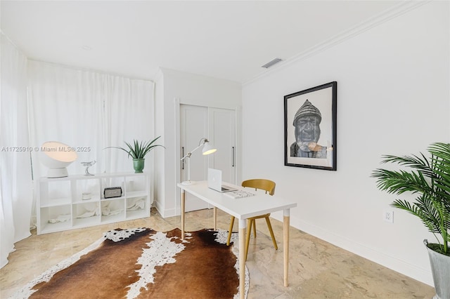 office area featuring crown molding