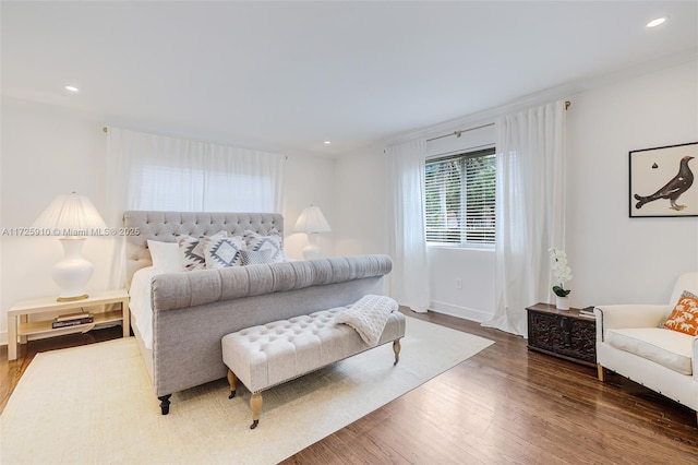 bedroom featuring hardwood / wood-style floors