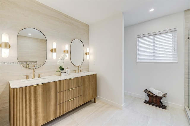 bathroom featuring tile patterned floors and vanity