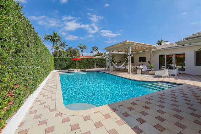 view of pool with a pergola, outdoor lounge area, and a patio