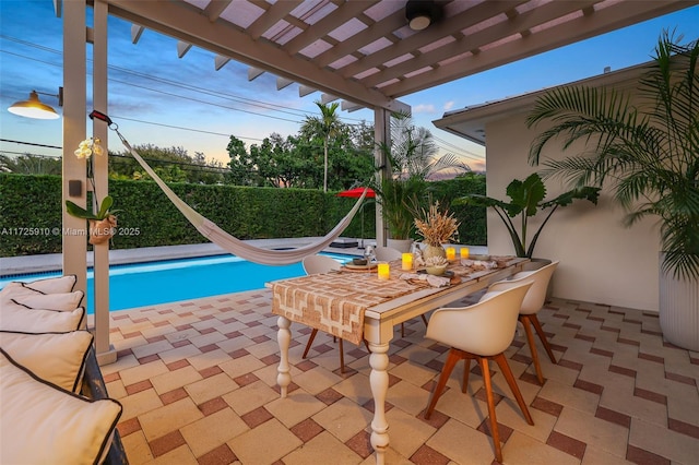 view of pool featuring a pergola, a patio area, and a water slide