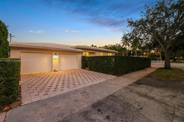 view of front of home featuring a garage