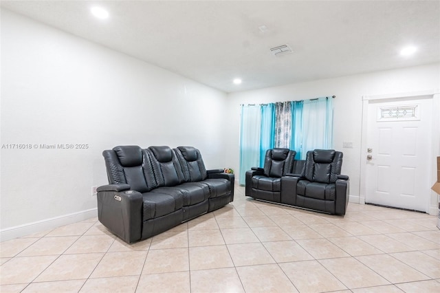 living room with light tile patterned floors