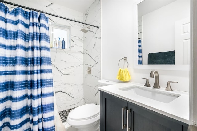 bathroom with toilet, a shower with shower curtain, and vanity