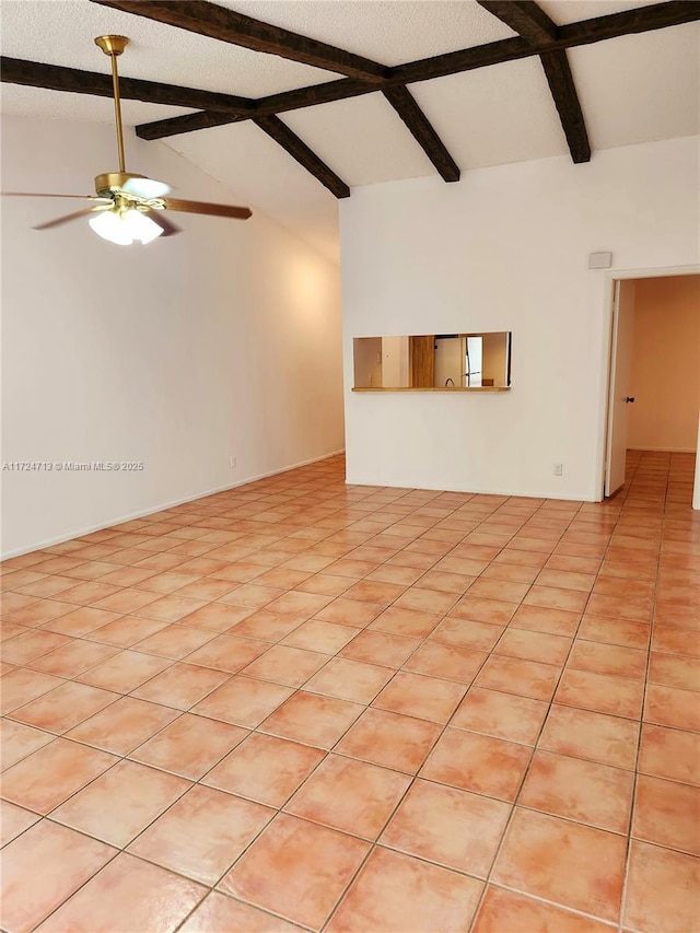 tiled spare room with beam ceiling, ceiling fan, and high vaulted ceiling