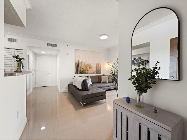 living room featuring light tile patterned flooring and crown molding