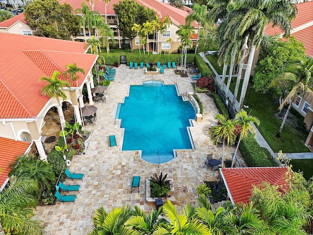 view of swimming pool with a patio area