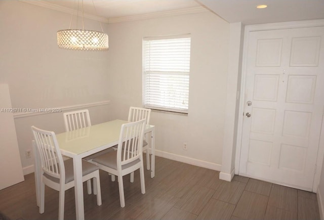 dining room featuring ornamental molding