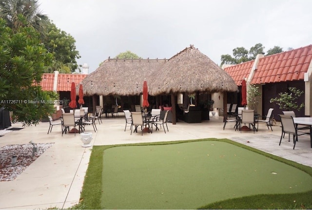 surrounding community with a patio