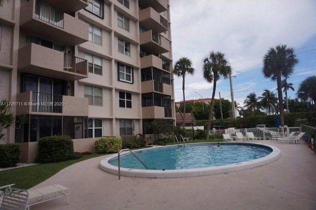 view of pool featuring a patio