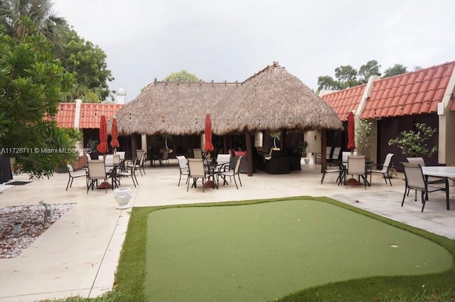 view of community with a patio