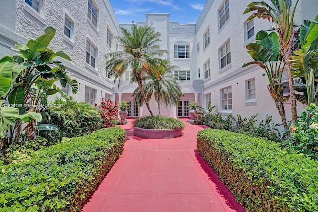 surrounding community featuring a patio area