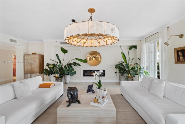 living room featuring ornamental molding