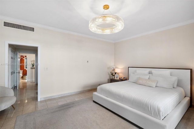 bedroom with ornamental molding and tile patterned floors