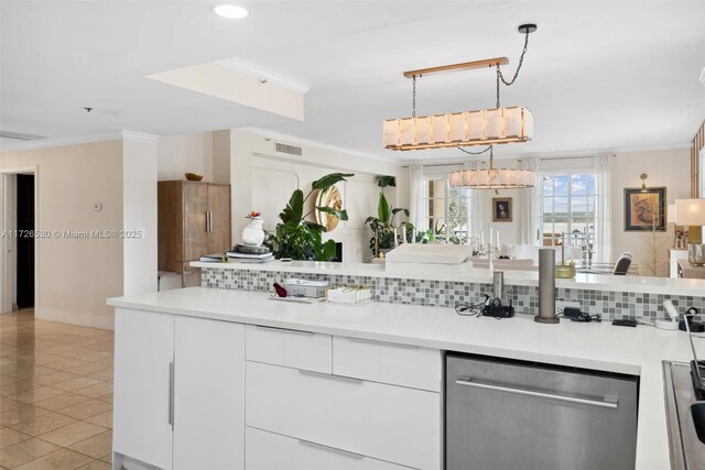 kitchen with sink, decorative light fixtures, white cabinets, an inviting chandelier, and light tile patterned flooring