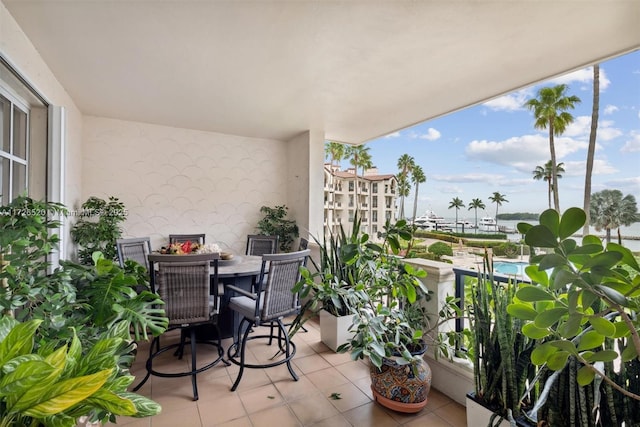 balcony featuring a water view