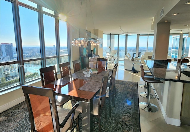 3535 S Ocean Dr Unit 2805, Hollywood, FL 33019 - tiled dining space with baseboards and a view of city