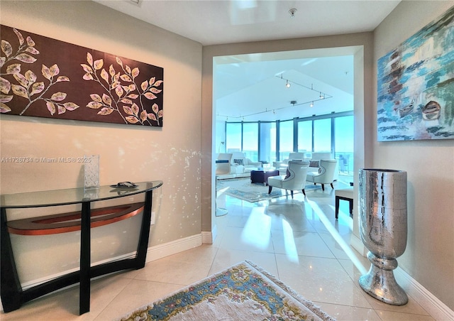 3535 S Ocean Dr Unit 2805, Hollywood, FL 33019 - hallway with baseboards, tile patterned floors, and track lighting
