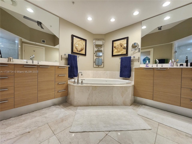 3535 S Ocean Dr Unit 2805, Hollywood, FL 33019 - bathroom featuring a garden tub, tile patterned floors, two vanities, recessed lighting, and a shower