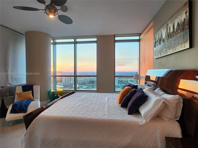 bedroom featuring floor to ceiling windows