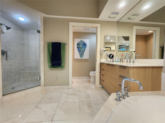 bathroom with toilet, a shower with door, and vanity