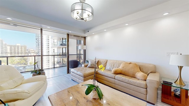 living room featuring a wall of windows