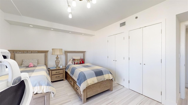 bedroom featuring two closets