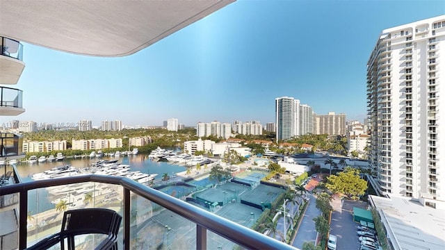 balcony featuring a water view