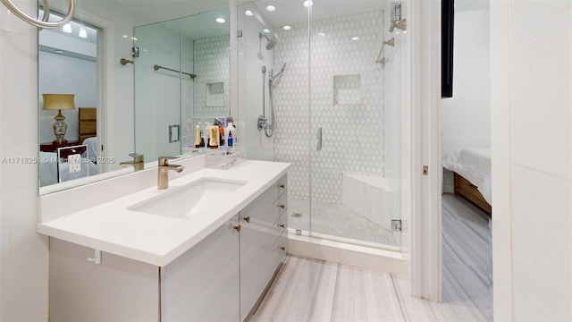 bathroom with vanity and walk in shower