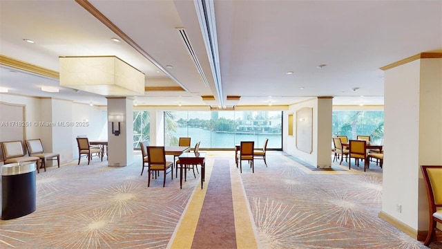 building lobby featuring a water view