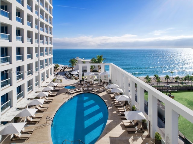 balcony featuring a water view