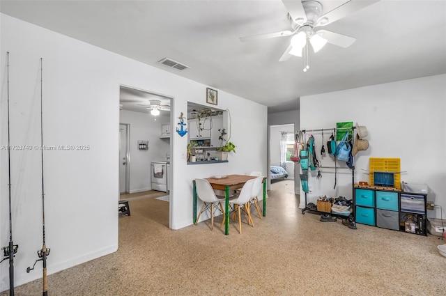 interior space with ceiling fan