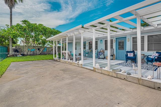 view of patio featuring a pergola