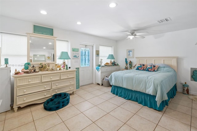 bedroom featuring ceiling fan and light tile patterned floors