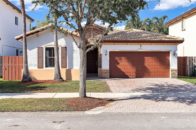 view of front of home featuring a garage